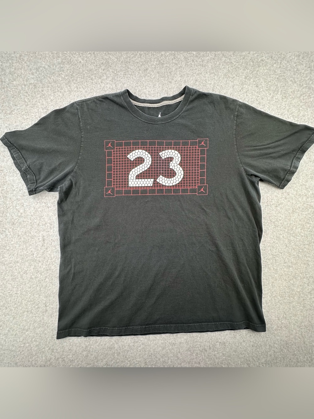 Jordan “23” Black Short Sleeve Tee with Red Grid Graphic - Adult